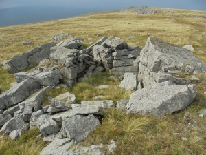 The boulder strewn plateau of Great Whernside leading towards the summits Trig Point